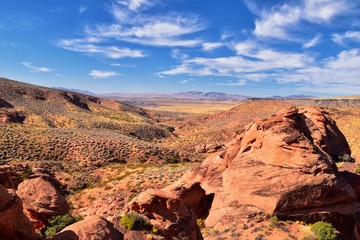 Red Cliffs National Conservation Area Wilderness and Snow Canyon State Park from the  Elephant Arch and bone wash Trail by St George, Utah in desert reserve. United States. USA.