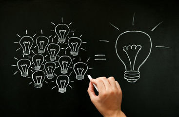 Teamwork Developing Idea Light Bulbs Concept