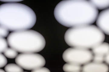 blurred photo of white lights