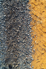 Road background or texture with gravel and sand