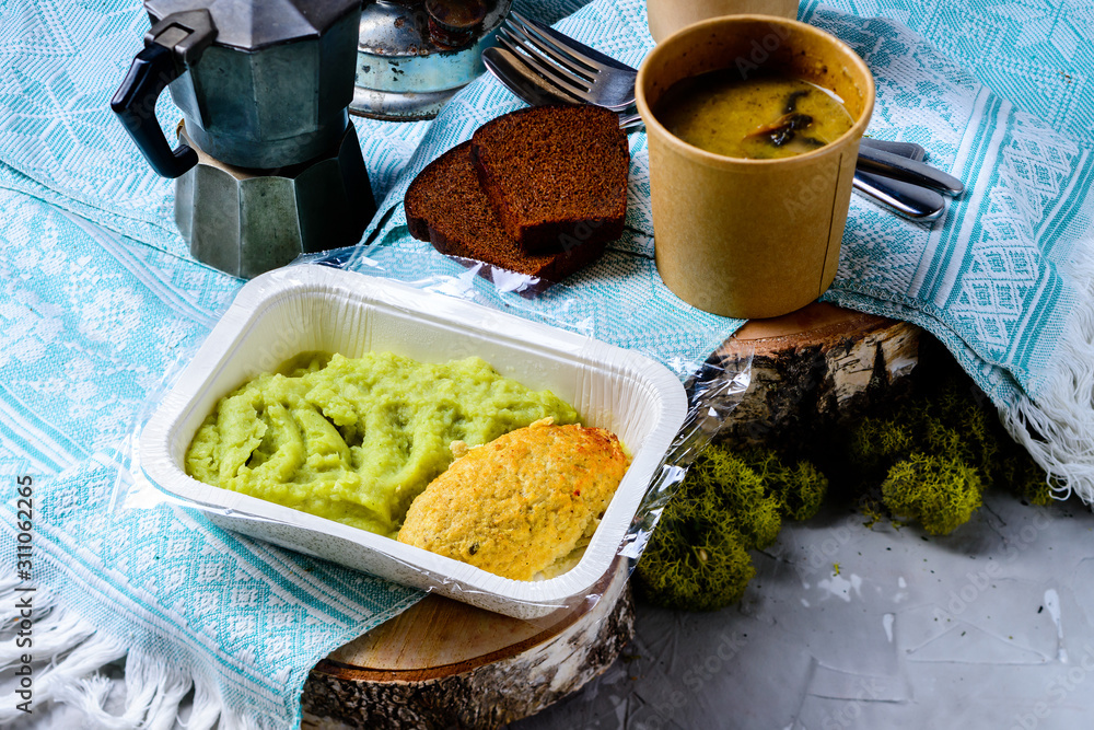 Wall mural cutlet and mashed potatoes in a container