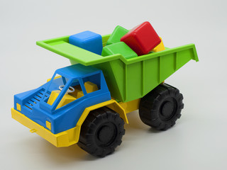 Toy car with multi-colored plastic cubes