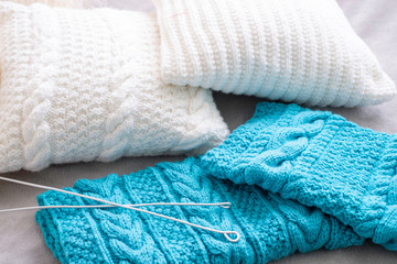 Fototapeta na wymiar Knitting set with white and blue yarn