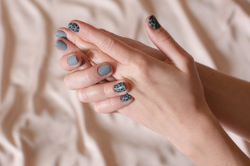 woman hands applying moisturizing cream to her skin