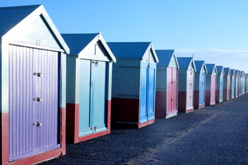 fifteen beach huts on Brighton promenade