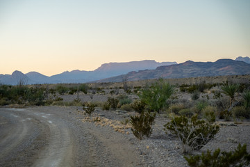 The sun begins to set over the mountains of West Texas. 