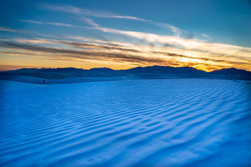 Sun begins to fall over the dunes of White Sands New Mexico. 