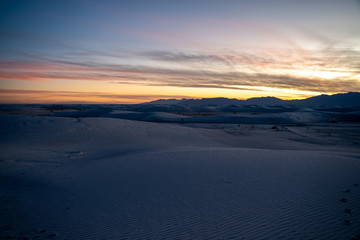 Fototapeta na wymiar Sun begins to fall over the dunes of White Sands New Mexico. 