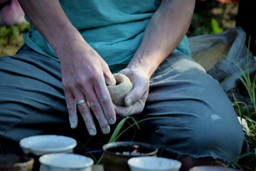 a master class in modeling clay dishes for a company of people
