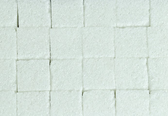 cubes of lump sugar laying flat on the table, texture