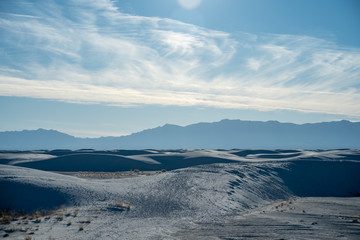 Obraz premium Views from the beutiful dunes of White Sands New Mexico as the sun sets over the desert. 