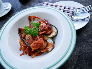 Mussels pasta in a restaurant in  Chiang rai, Bangkok Thailand