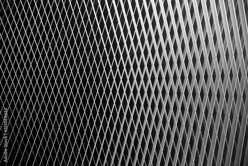 Poster digitally rendered image of metal grid structure. abstract black and white checkered background for 