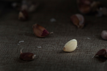 garlic bulb, split garlic, garlic cloves and squeezed garlic , Close up of garlic.