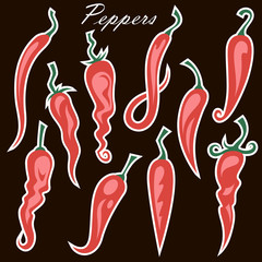 collection of red hot chili peppers isolated on black background