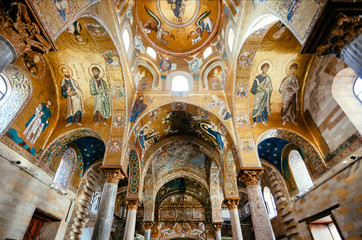 Fototapeta na wymiar Byzantine mosaics inside the famous 12th century Martorana cathedral on 12th century walls, Palermo. Sicily.