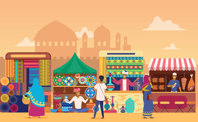 Indian street market at sunset flat vector illustration. Cartoon characters shopping at outdoor marketplace. Cheerful vendors selling handmade home decor goods. Sellers at stalls. Temples background