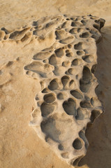 stone in sand