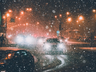 Headlights in the night winter city traffic.