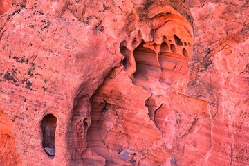 Red and Orange Sandstone Rock Formations along the Bone Wash Elephant Arch Trail in Red Cliffs National Desert Reserve in Saint George, Utah. United States.