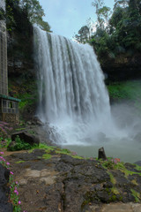 Obraz premium Waterfall Dambri . One of the biggest waterfall in the jungle of Vietnam near the town of Baolok.