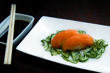 Salmon nigiri on a white plate, nigiri sushi, asian food, japanese cuisine