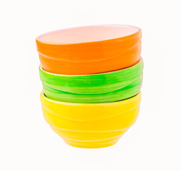 Colorful empty ceramic bowls stacked
