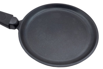 Round cast iron griddle pan isolated on white