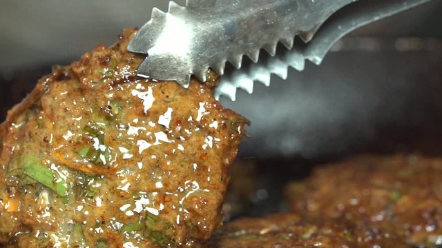 Golden brown fried fritters close up in home kichen