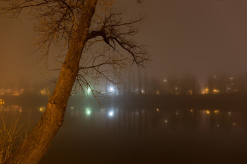 Thick Fog in the night Holesovice about River Vltava. Holesovice is the most cool Prague District, Czech Republic. © Kajano