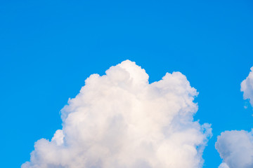 Big white cloud in the blue sky.