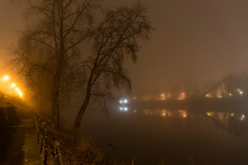Thick Fog in the night Holesovice about River Vltava. Holesovice is the most cool Prague District, Czech Republic. © Kajano