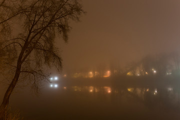 Thick Fog in the night Holesovice about River Vltava. Holesovice is the most cool Prague District, Czech Republic.
