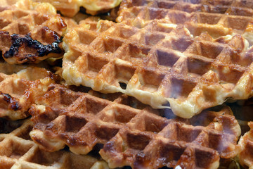 Delicious crispy sweet Belgian waffles. Tasty trip.
