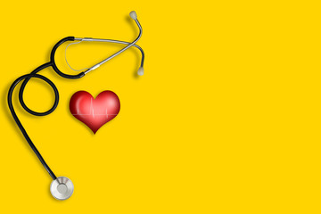 Red heart with stethoscope yellow background