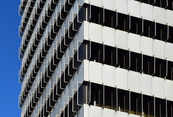 abstract geodimensional facade of building against the sky