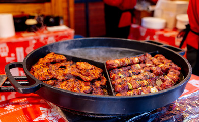 traditional meat in smoke in Christmas market in Wroclaw, Poland