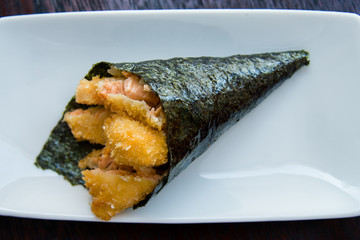 temaki hot salmon in white porcelain dish, asian food, japanese cuisine, top view