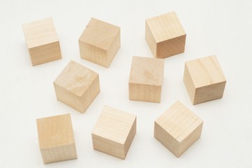 Wooden cubes on white background 