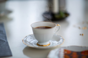 Cup of coffee on table in a cafe
