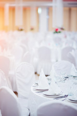 Wedding table in white decoration cloth in wedding venue