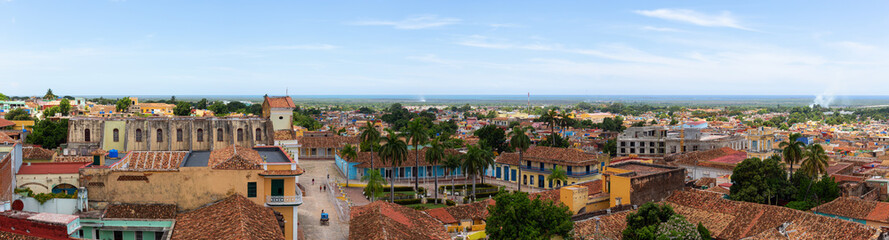 Fototapeta premium Aerial panoramic view of a small touristic Cuban Town during a sunny and cloudy summer day. Taken in Trinidad, Cuba.