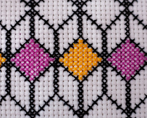 Pattern embroidered with a cross