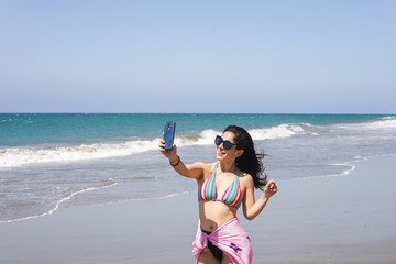 Fototapeta na wymiar selfie of a woman in the sea