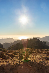 Rock stacking and view of Roque Nublo, Gran Canaria in the Canary Islands
