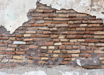 Vintage, damaged brick wall background. 