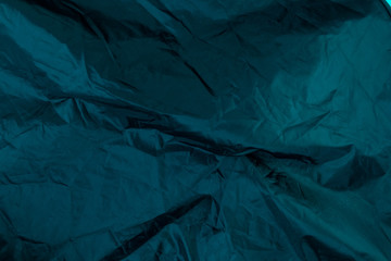 Dark satin material texture. Creative background.