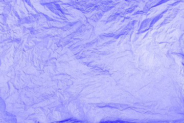 Blue, violet, purple background. Creased paper texture.