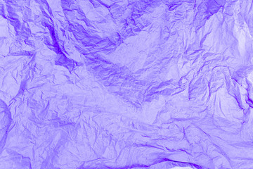 Blue, violet, purple background. Creased paper texture.