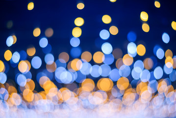 Abstract  blue and yellow light bokeh background , Christmas and Happy new year concept